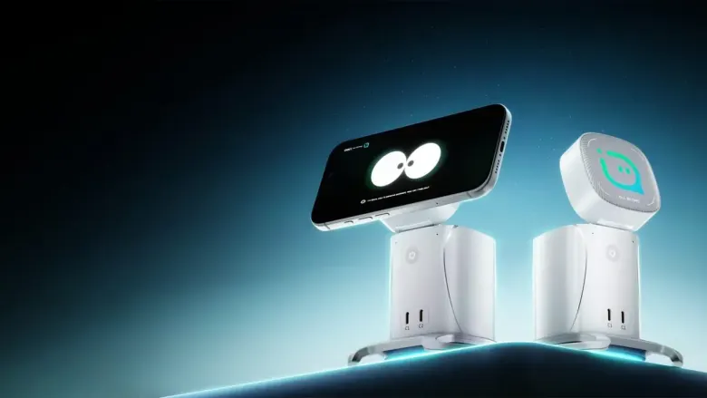 Dwie stacje PISEN iDock z portami USB-C, jedna z telefonem wyświetlającym animowane oczy