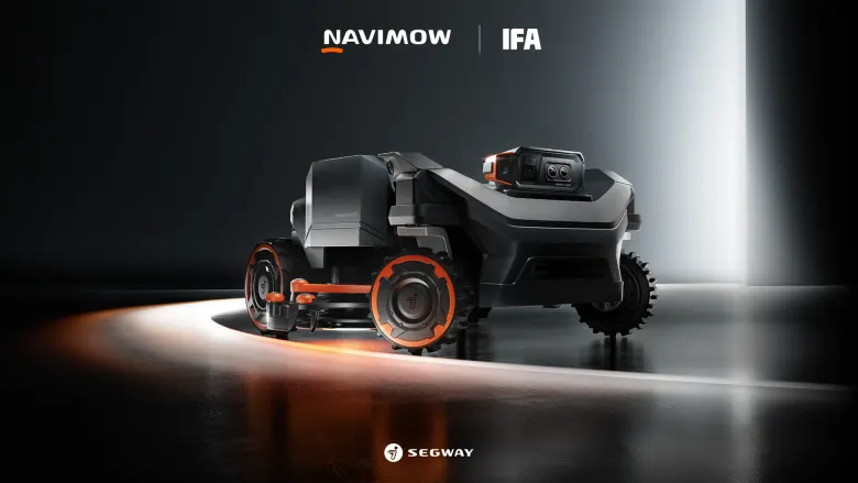Robot koszący Segway Navimow H5 Pro z wysuniętym pomarańczowym ramieniem EdgeMaestro – render z premiery na IFA 2026