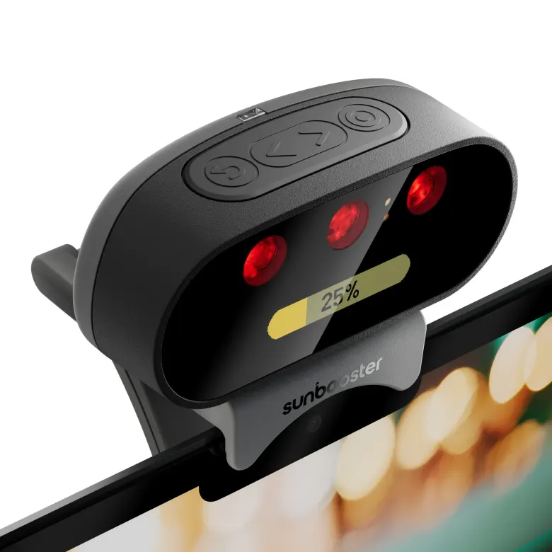 SunBooster na krawędzi monitora – trzy diody LED, przyciski i wskaźnik postępu dziennej dawki