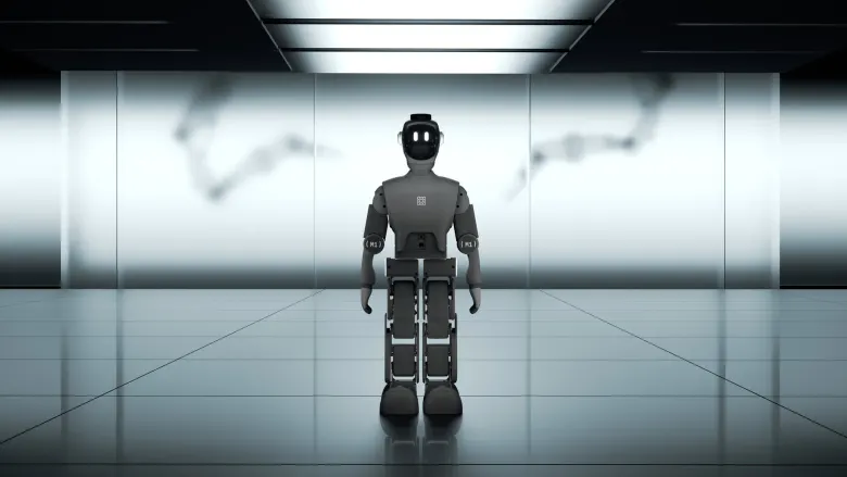Mały humanoid Zeroth M1 stojący w jasnym pomieszczeniu